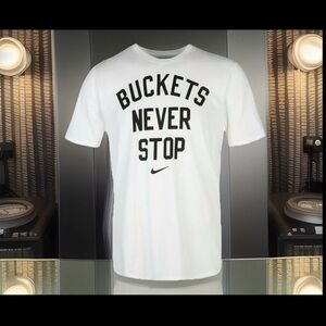 Vintage NIKE DRI FIT “BUCKETS NEVER STOP.” White Basketball Short Sleeve T-Shirt